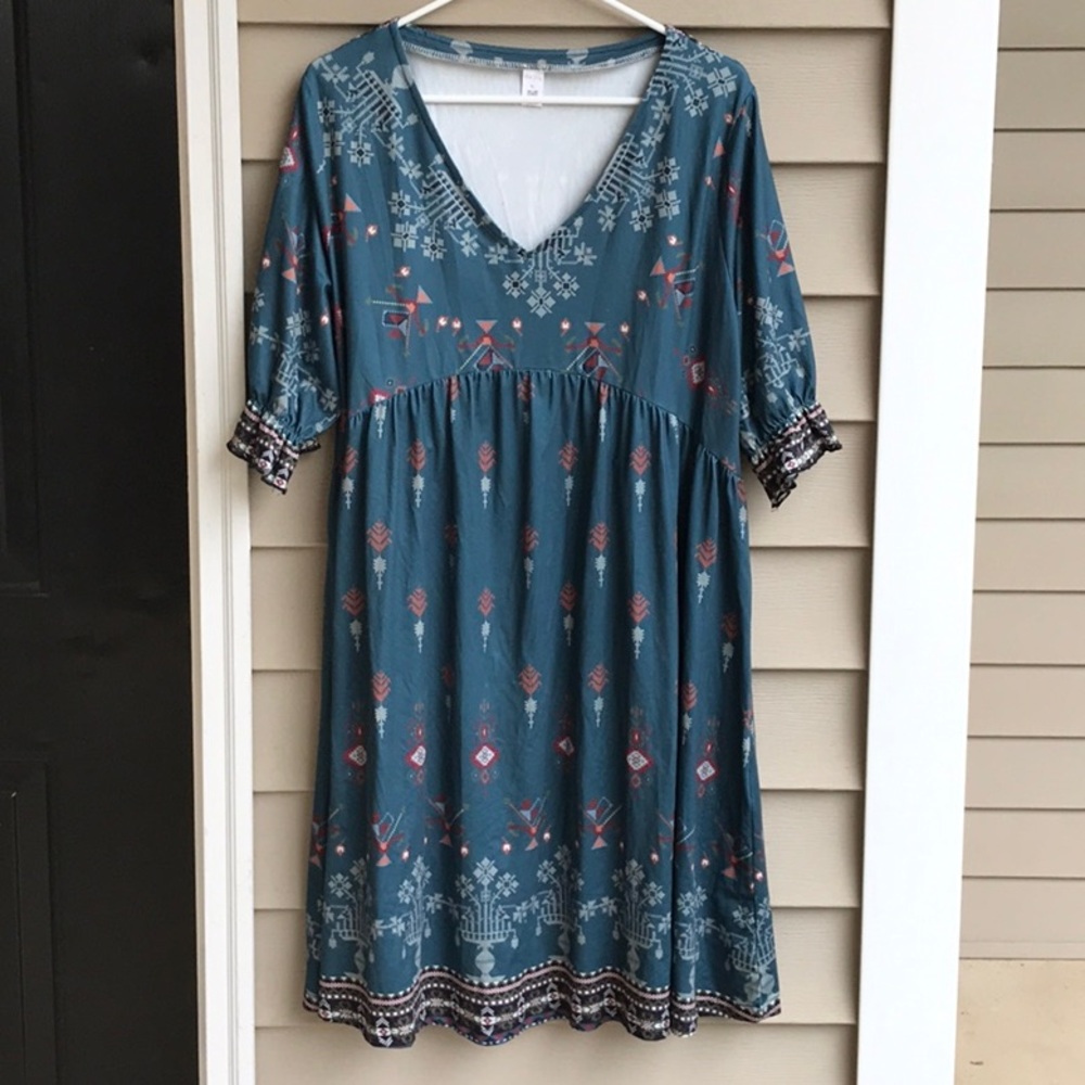 Dark teal with an Aztec pattern is another softie from my closet. Size XL